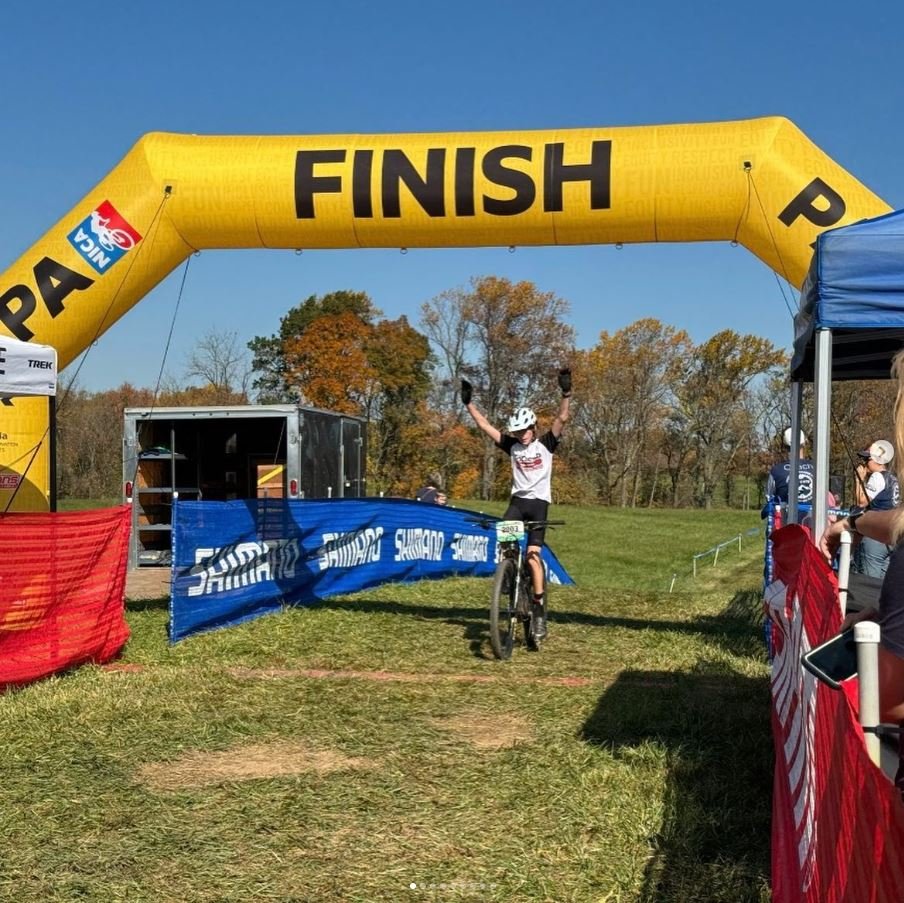 Hellbenders rider crossing a race finish line