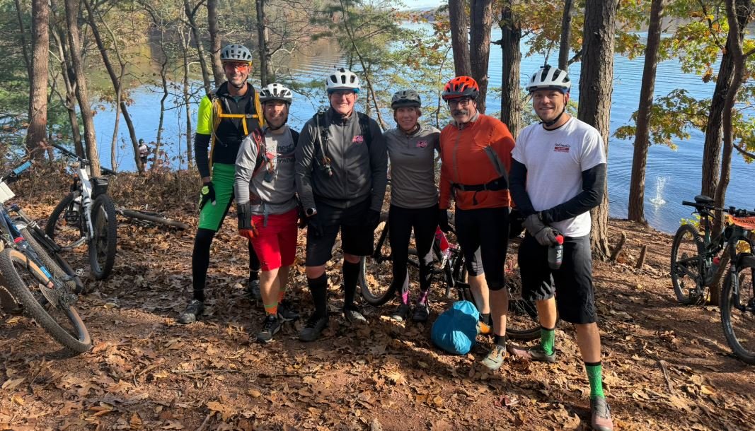 Hellbenders coaches riding together at practice